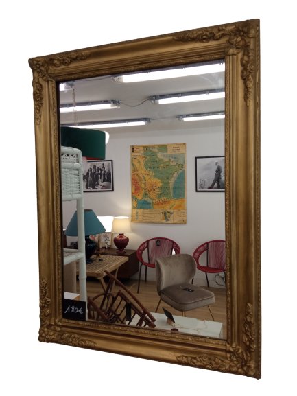 Miroir mural ancien doré en bois avec sculptures florales